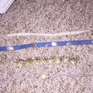 4 band new chokers.